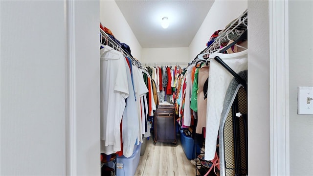 walk in closet featuring light wood-type flooring