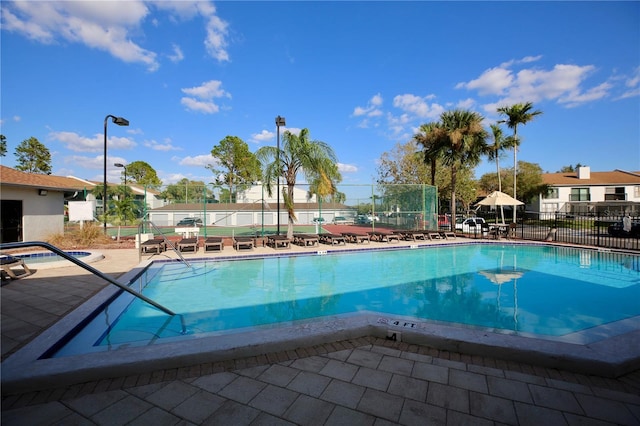 view of pool featuring a patio