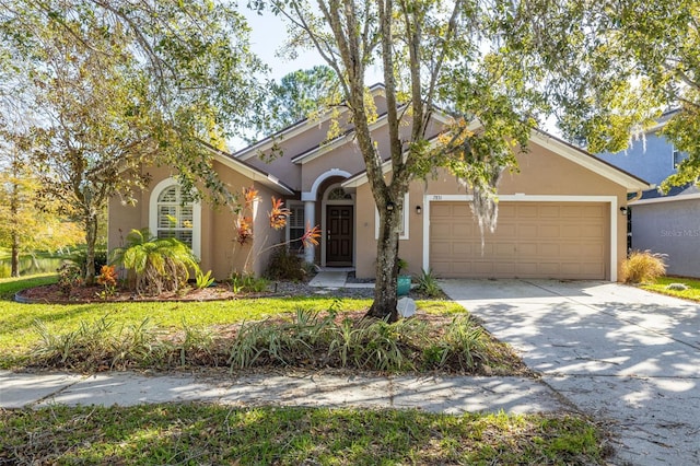 view of front of property featuring a garage