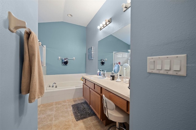 bathroom with vanity, tile patterned floors, lofted ceiling, and plus walk in shower