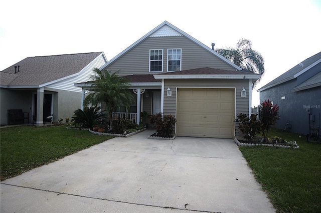 view of front of house with a garage, a front lawn, and a porch