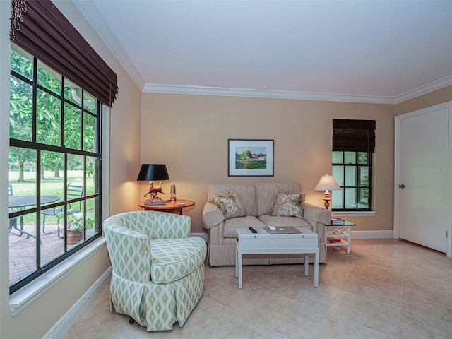 living room with a healthy amount of sunlight, ornamental molding, and light tile patterned floors