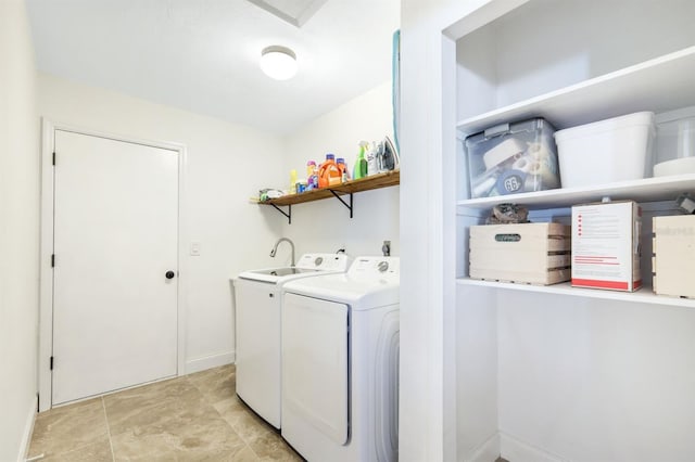 washroom featuring washing machine and dryer