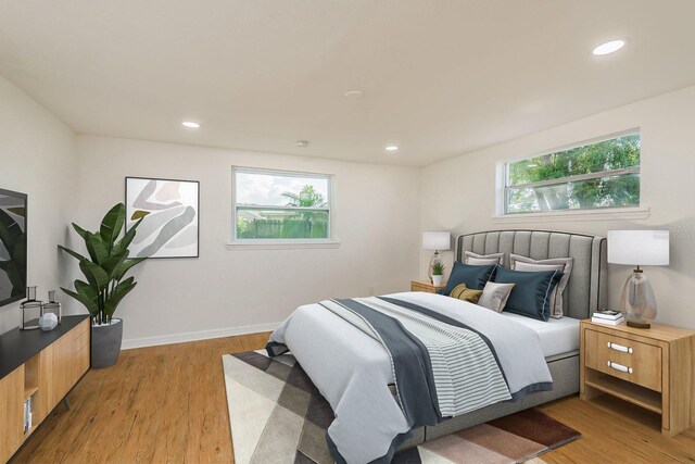 bedroom with light hardwood / wood-style flooring