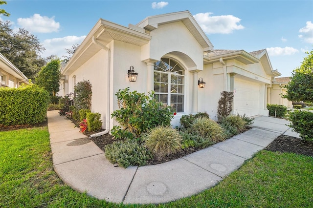 view of property exterior with a garage