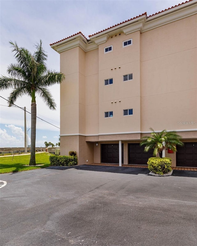 view of building exterior with a garage