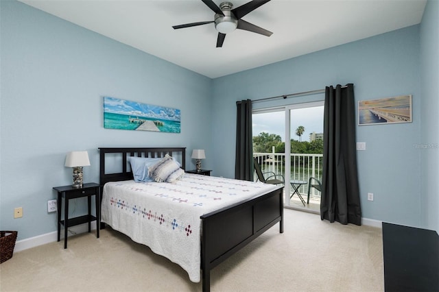 bedroom featuring ceiling fan, light carpet, and access to exterior