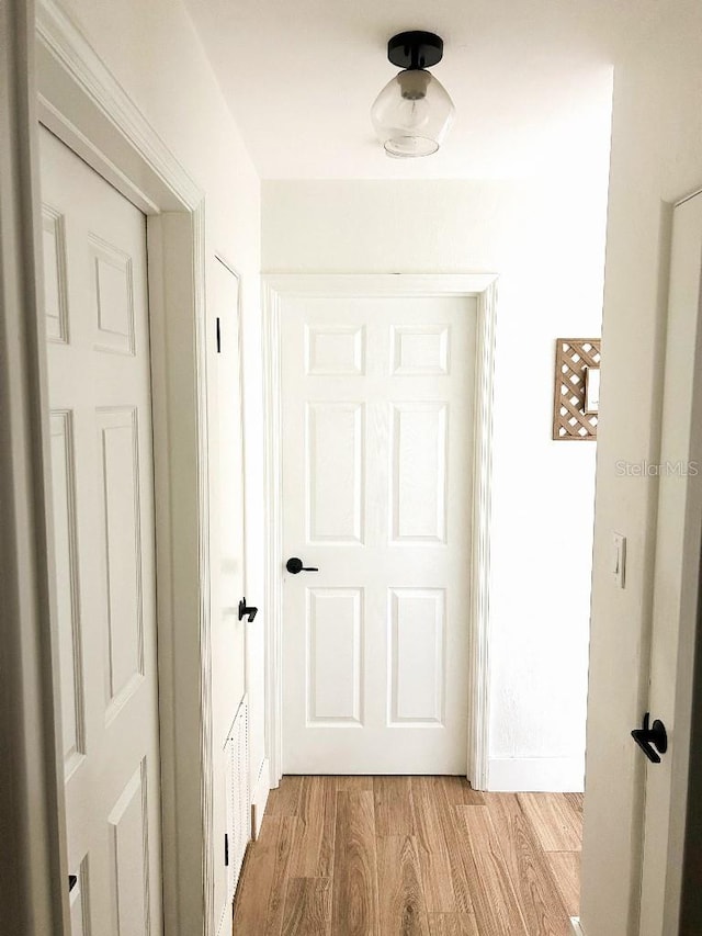 hall featuring light wood-type flooring