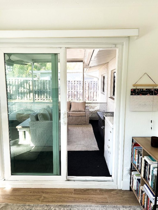 doorway to outside featuring hardwood / wood-style flooring