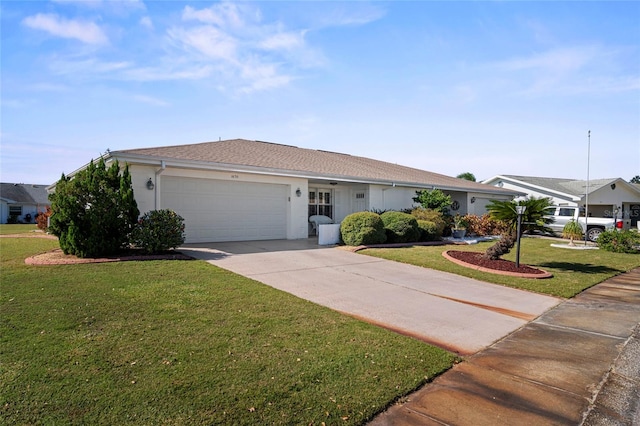 ranch-style home with a front yard and a garage