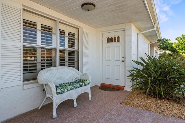 entrance to property with covered porch