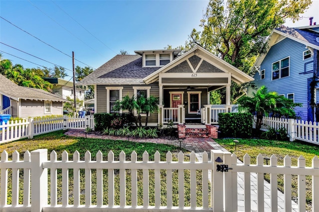 view of front of home featuring a front lawn and a porch