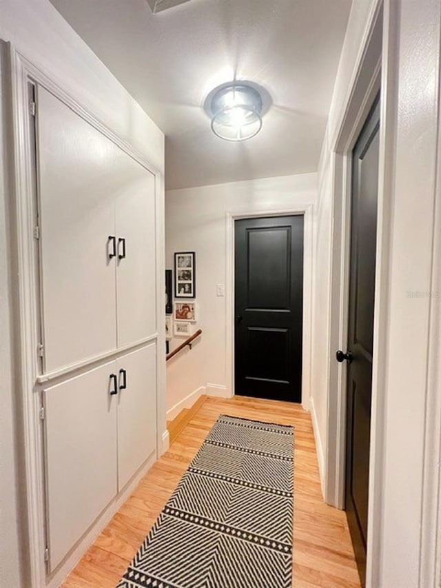 doorway with light hardwood / wood-style flooring