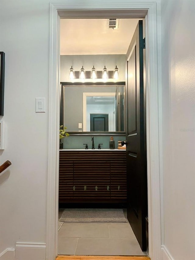 bathroom featuring vanity and tile patterned floors