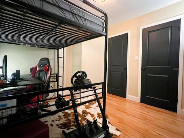 bedroom featuring hardwood / wood-style flooring