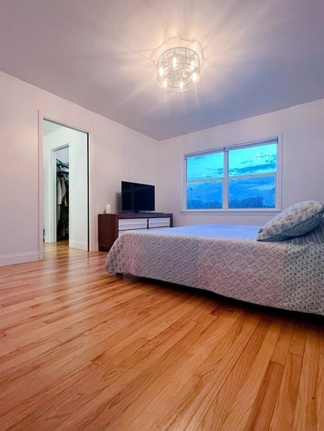 bedroom with light hardwood / wood-style floors