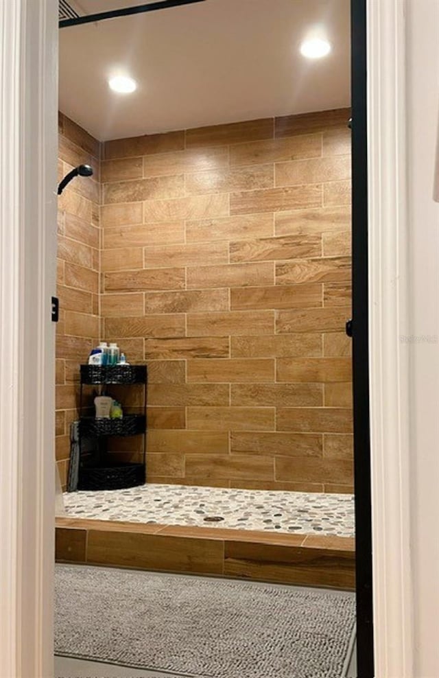 bathroom featuring a shower