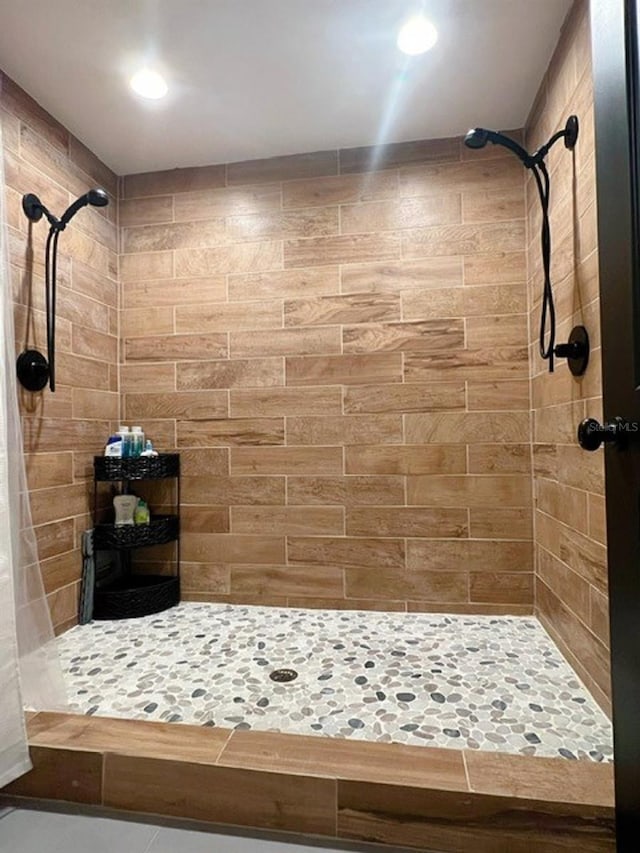 bathroom featuring a shower with curtain