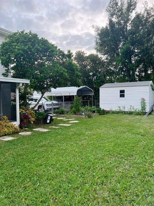 view of yard with a storage shed