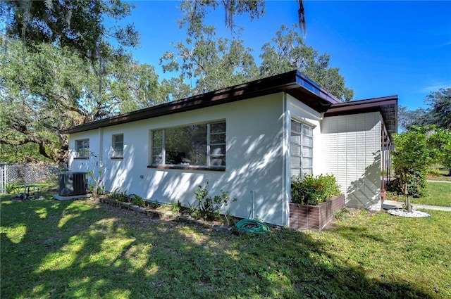 1802 E Hamilton Ave, Tampa, FL 33610 - view of side of property featuring a cooling unit