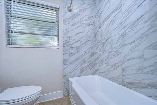 1802 E Hamilton Ave, Tampa, FL 33610 - full bathroom featuring toilet and baseboards