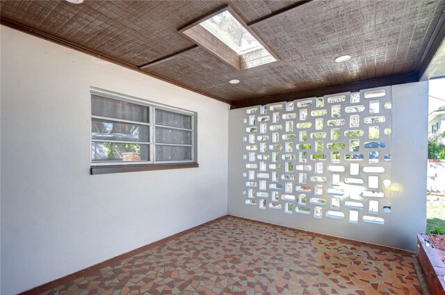 1802 E Hamilton Ave, Tampa, FL 33610 - unfurnished room with a skylight