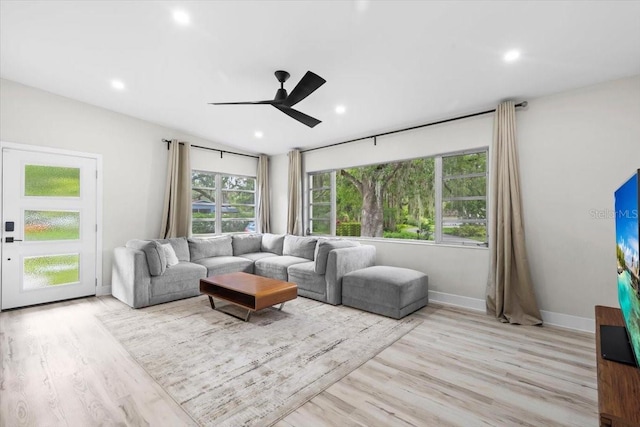 1802 E Hamilton Ave, Tampa, FL 33610 - living area with a ceiling fan, wood finished floors, and recessed lighting