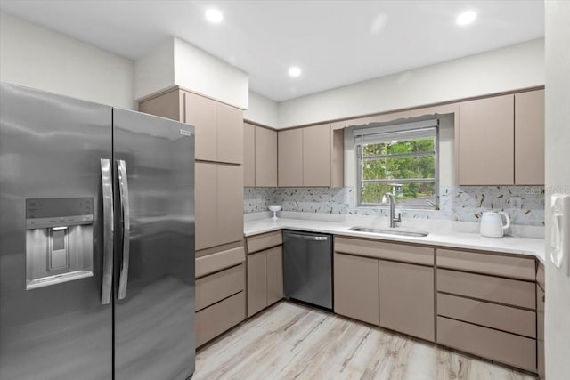 1802 E Hamilton Ave, Tampa, FL 33610 - kitchen featuring stainless steel appliances, light countertops, tasteful backsplash, and recessed lighting