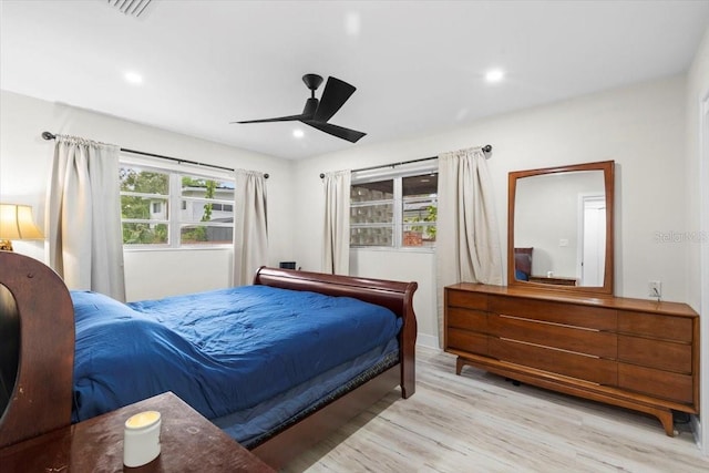 1802 E Hamilton Ave, Tampa, FL 33610 - bedroom with light wood-type flooring, a ceiling fan, and recessed lighting