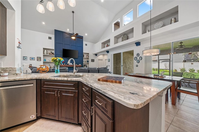 kitchen featuring hanging light fixtures, high vaulted ceiling, dishwasher, dark brown cabinetry, and sink