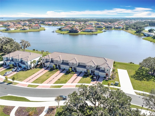 drone / aerial view with a water view