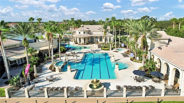 view of swimming pool with a patio area