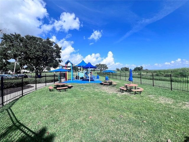 view of jungle gym with a yard