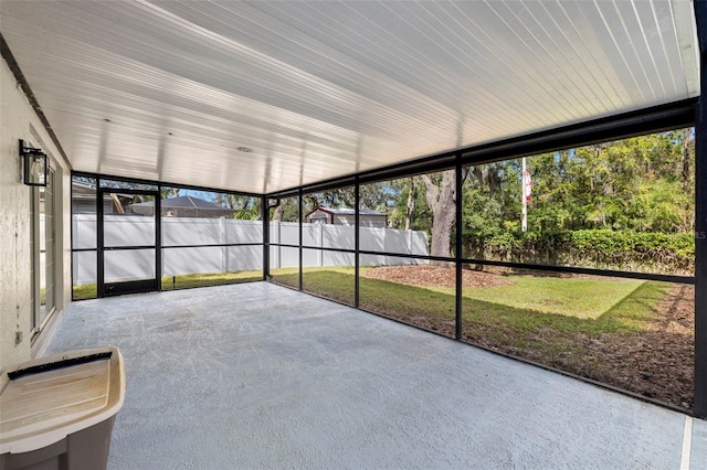 unfurnished sunroom with plenty of natural light