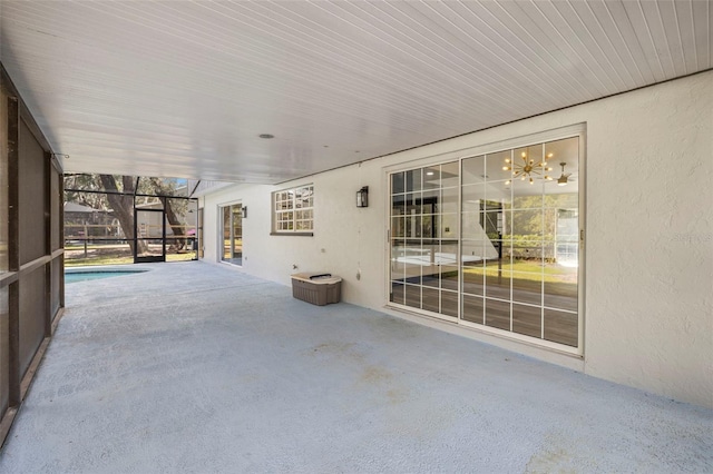 view of patio / terrace with glass enclosure