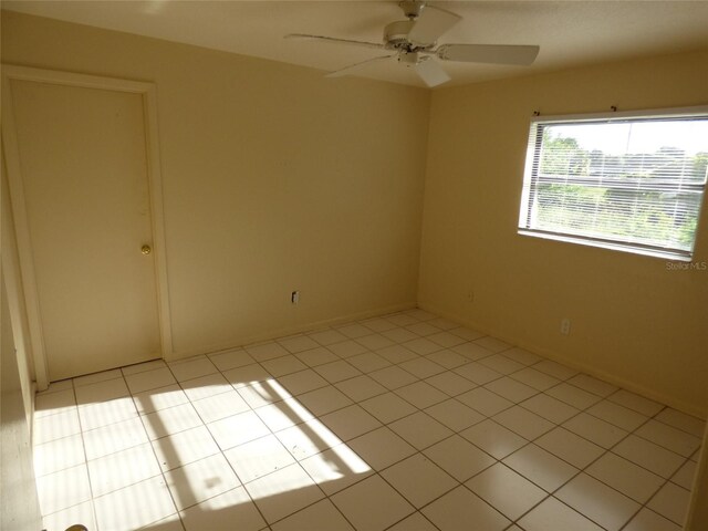 27242 Sunnybrook Rd Unit B, Punta Gorda, FL 33983 - spare room featuring light tile patterned floors and a ceiling fan