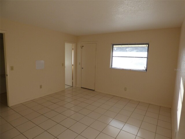 27242 Sunnybrook Rd Unit B, Punta Gorda, FL 33983 - spare room featuring baseboards