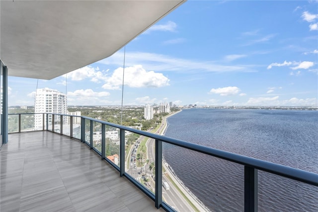 balcony featuring a water view