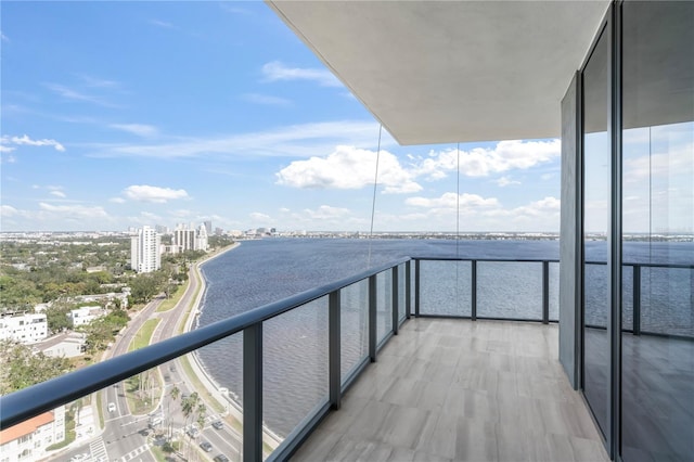 balcony featuring a water view