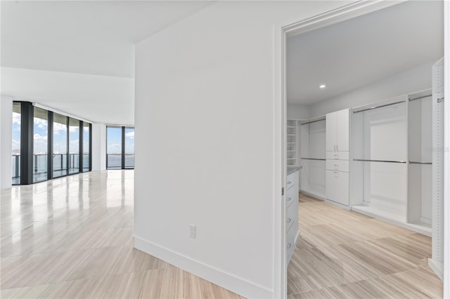2912 W Santiago St Unit 1901, Tampa, FL 33629 - hall with floor to ceiling windows and baseboards