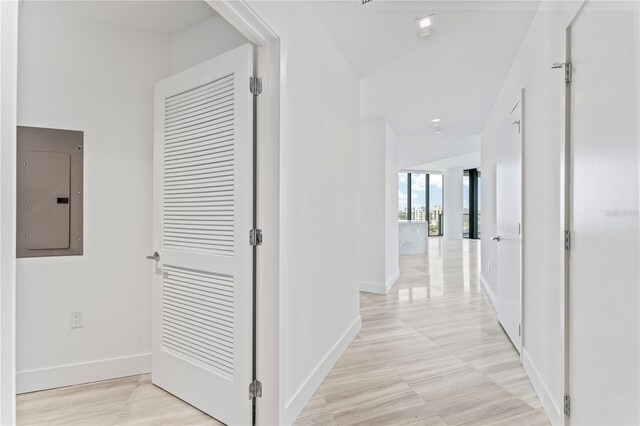 hallway featuring electric panel