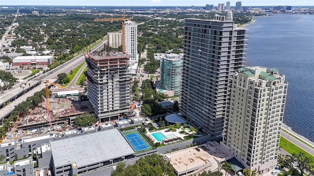 birds eye view of property with a water view