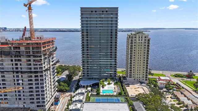 birds eye view of property featuring a water view