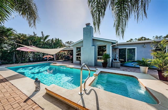 view of pool with a patio area