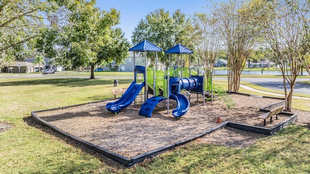 view of play area featuring a lawn