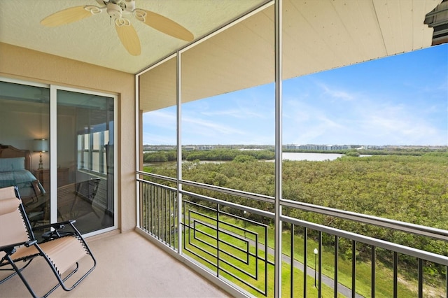 balcony featuring ceiling fan