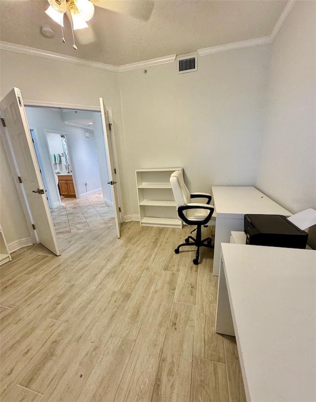 home office featuring a textured ceiling, ceiling fan, crown molding, and light hardwood / wood-style flooring