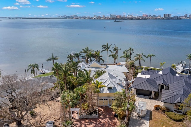 birds eye view of property featuring a water view