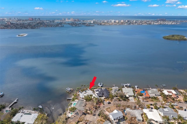 birds eye view of property featuring a water view