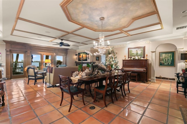 dining area with ceiling fan with notable chandelier, tile patterned floors, and ornamental molding